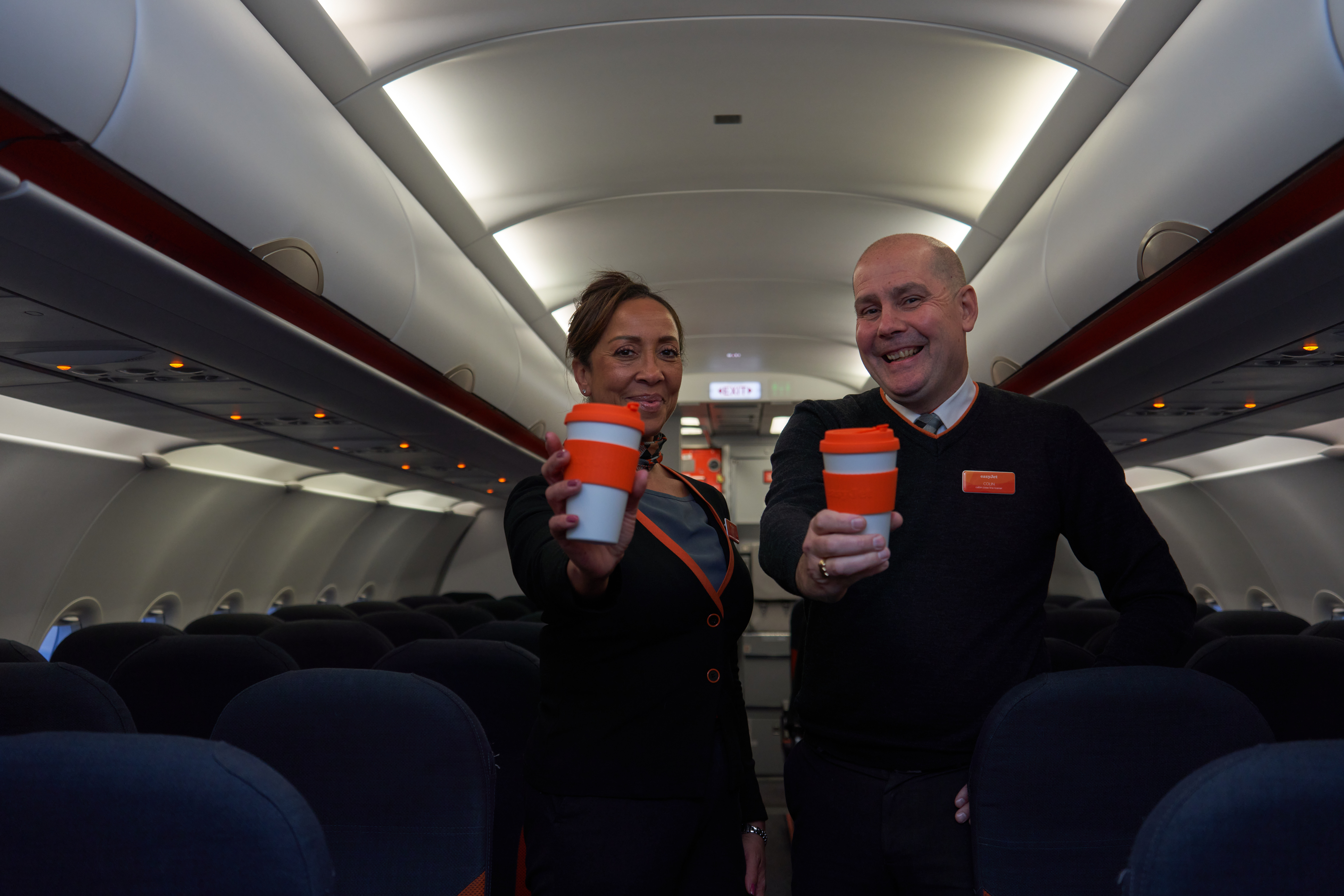 easyJet crew pose with reusable cups
